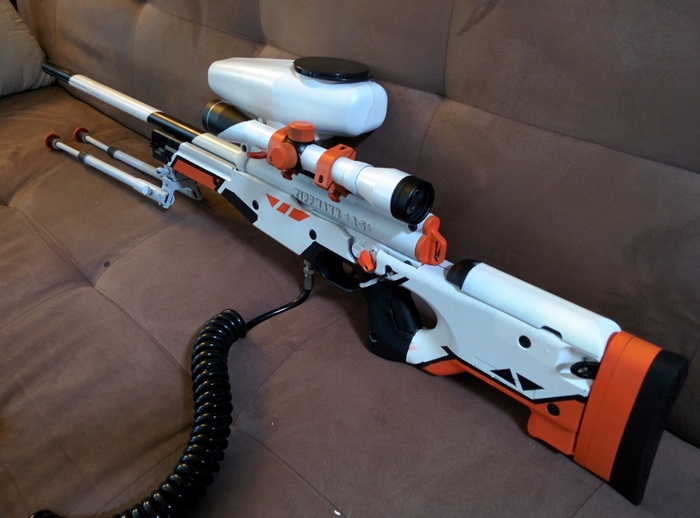 White and orange sniper rifle with scope