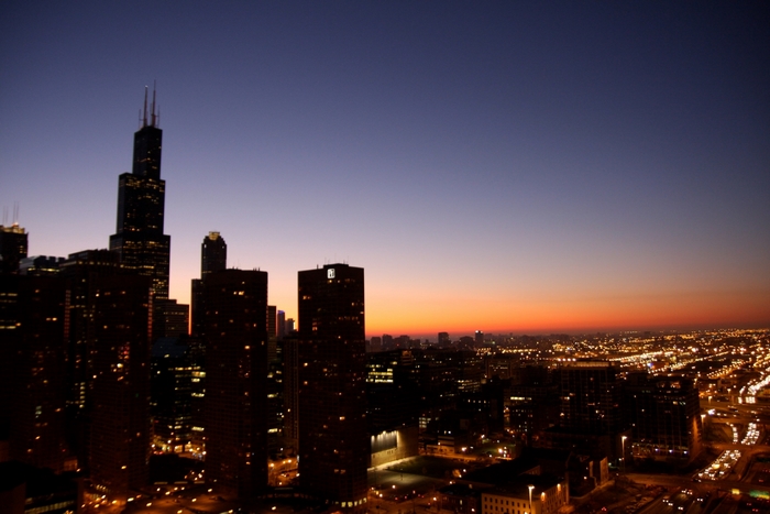 Chicago skyline at dusk with city lights
