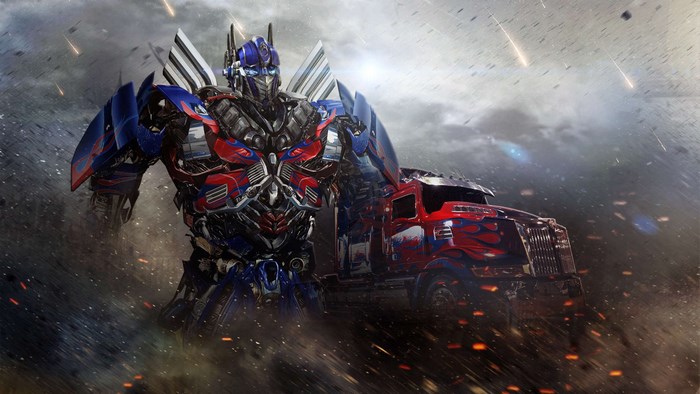 Optimus Prime with Truck Amid Stormy Battle Scene