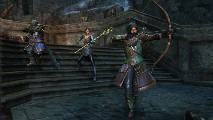 Three characters in armor with weapons in a stone environment