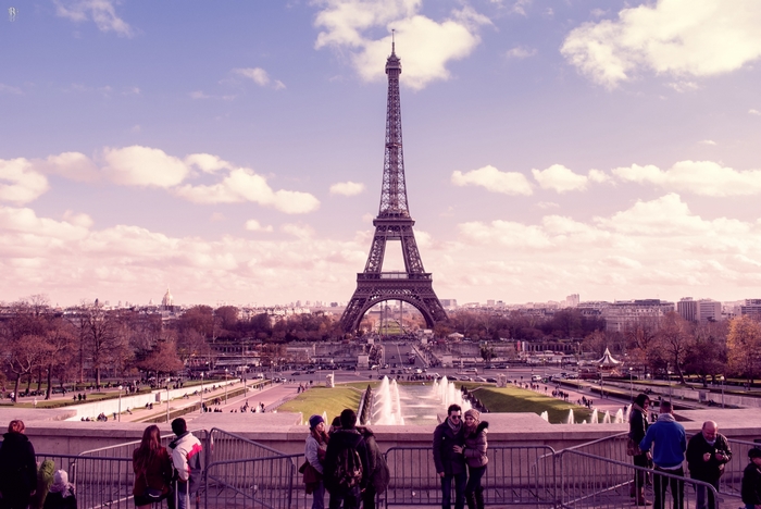 Eiffel Tower in Paris with people and fountains