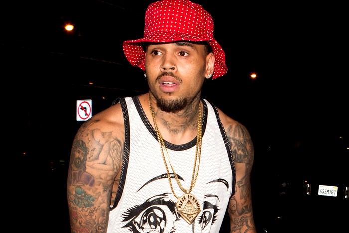 Chris Brown wearing a red polka dot bucket hat
