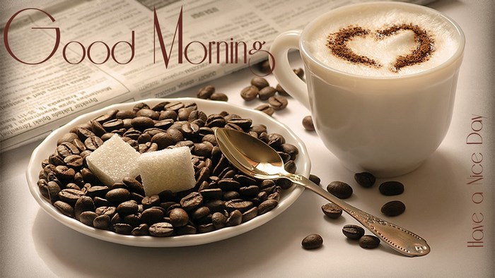 Good Morning coffee with heart art and newspaper