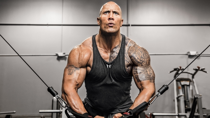 Dwayne Johnson working out with cables