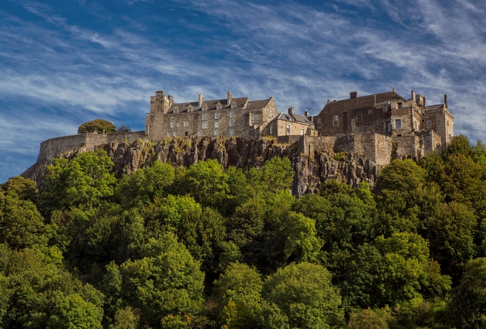 Stirling Castle on a rocky outcrop with trees