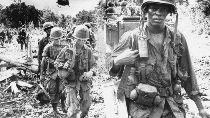 Vietnam War Soldiers Marching Through Jungle