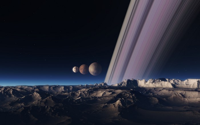 Planetary landscape with Saturn-like rings and moons