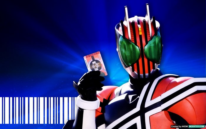 Kamen Rider Decade holding a card