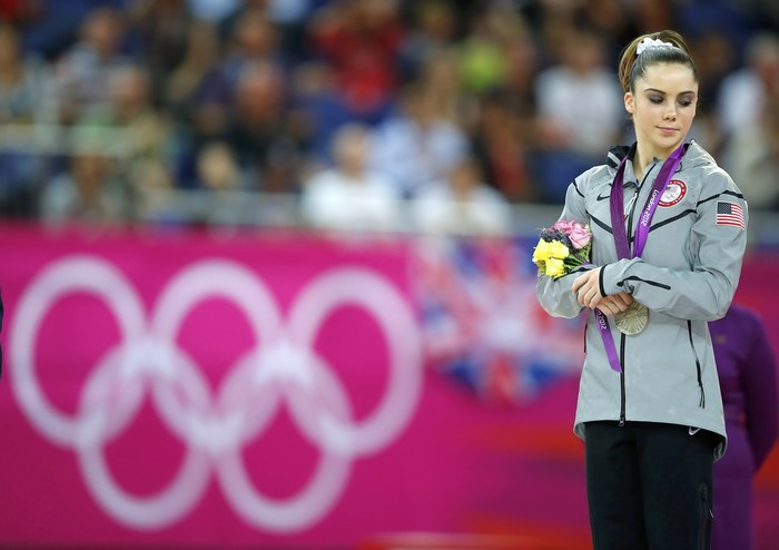 Mckayla Maroney with flowers and medal at London 2012