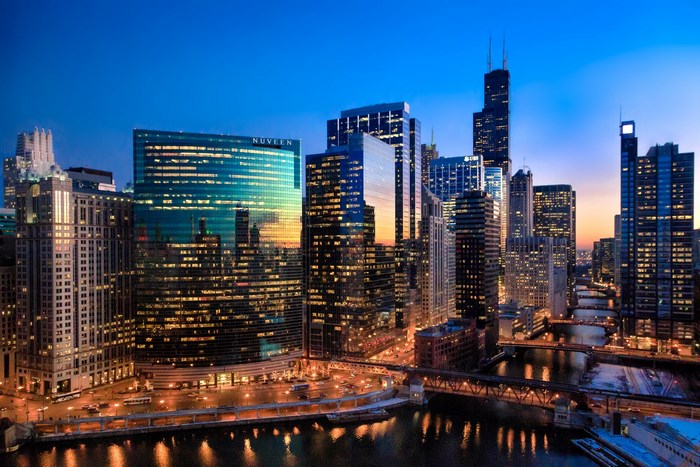 Chicago skyline at dusk with Nuveen building