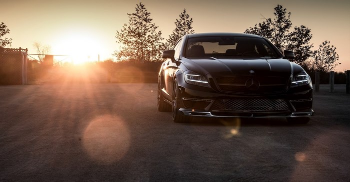 Black Mercedes-Benz CLS 63 AMG at sunset