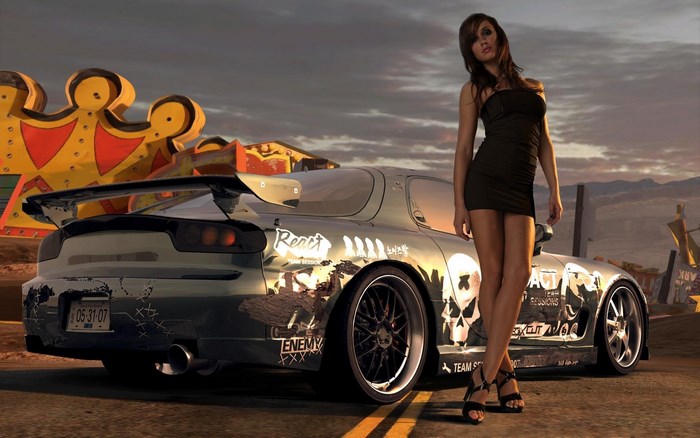 Woman posing with a modified car