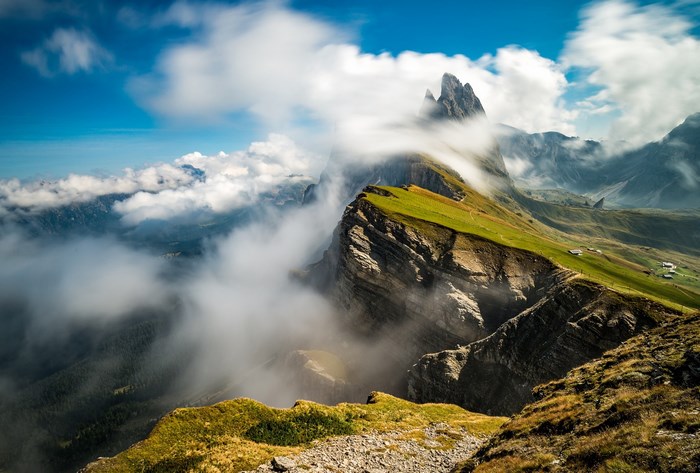 Majestic Mountain Peaks with Rolling Clouds