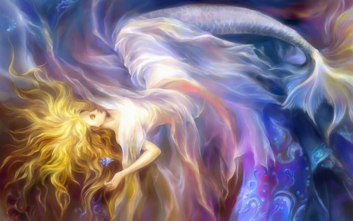 Mermaid with flowing hair and tail