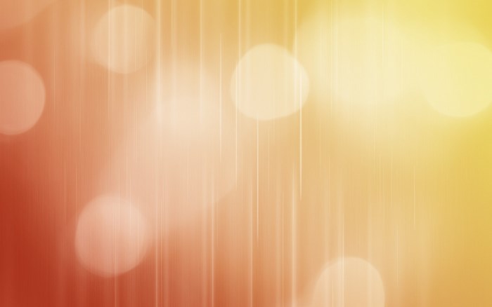 Orange and yellow abstract bokeh with vertical lines