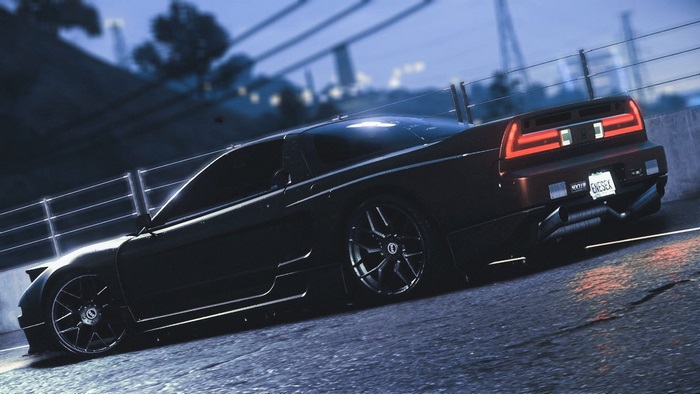 Need for Speed car on a road at night