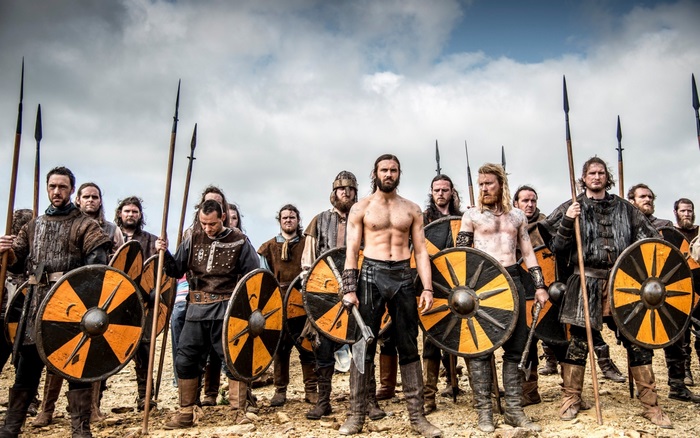 Vikings warriors with shields and spears
