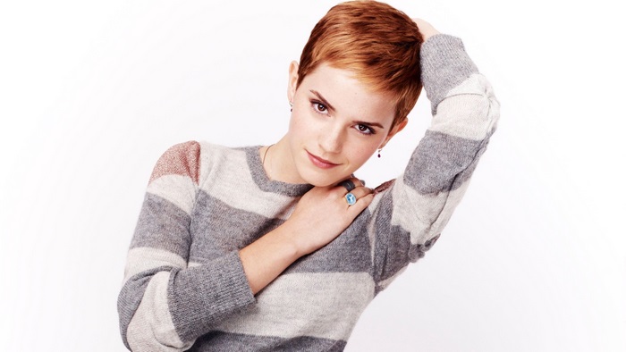 Emma Watson wearing a striped sweater