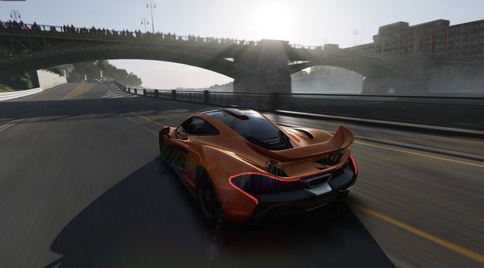 Orange McLaren P1 driving under a bridge in Forza Motorsport 6 4K