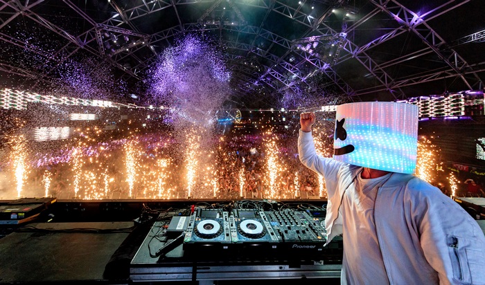 Marshmello performing live with fireworks