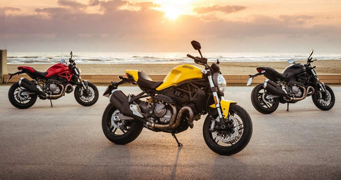 Ducati Monster 821 motorcycles at sunset