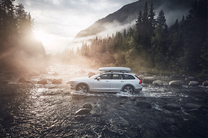 Volvo V90 Cross Country driving through a river
