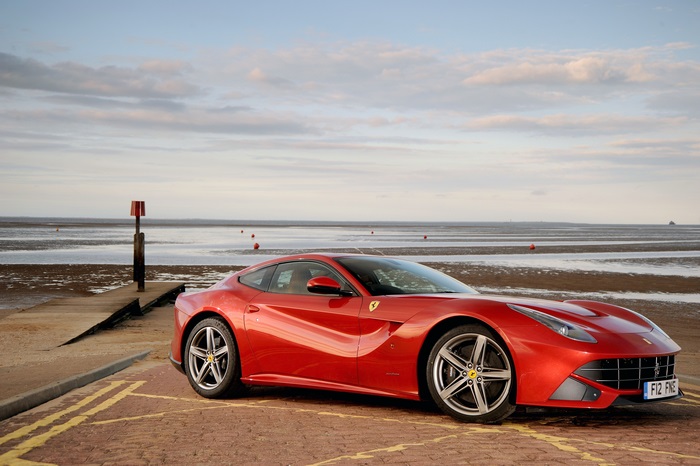 Ferrari F12berlinetta on a beach