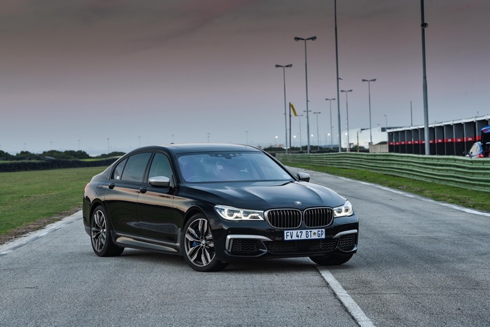 Black BMW 7 Series on a Race Track