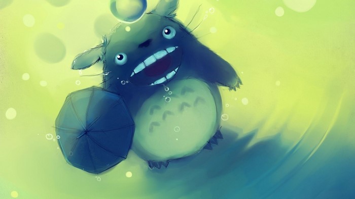 Totoro from My Neighbor Totoro holding an umbrella