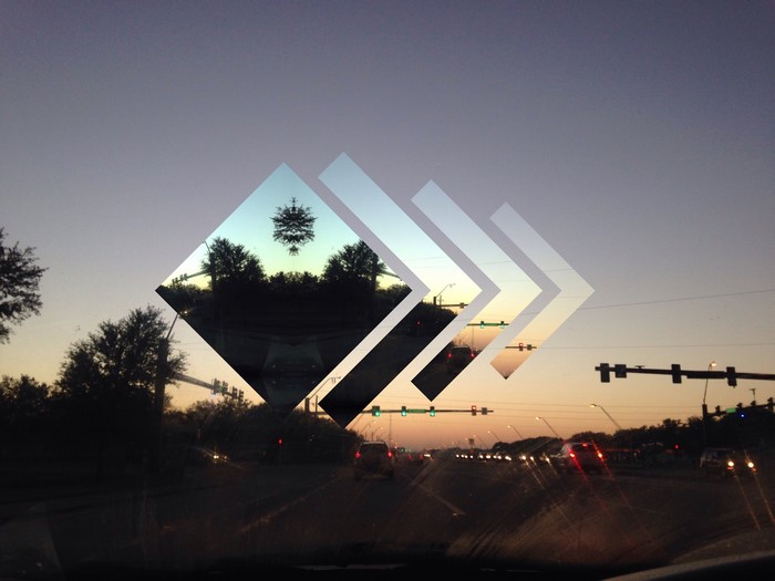 Geometric overlay on a road at sunset