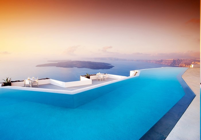 Infinity pool overlooking the sea in Santorini, Greece