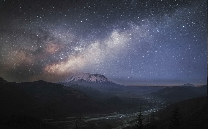 Milky Way over Mount St. Helens valley at night