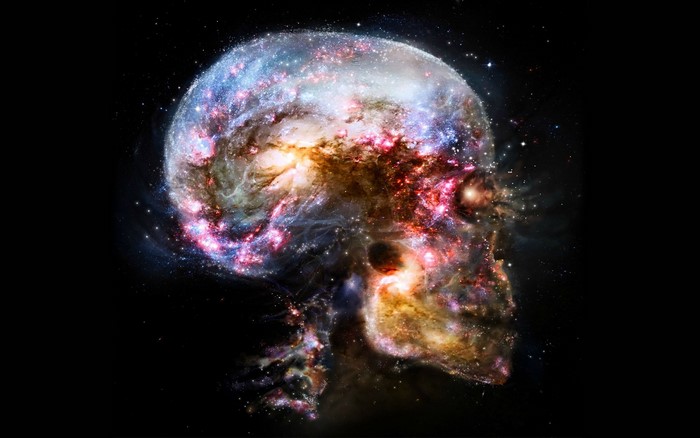 Skull formed from a colorful galaxy in space