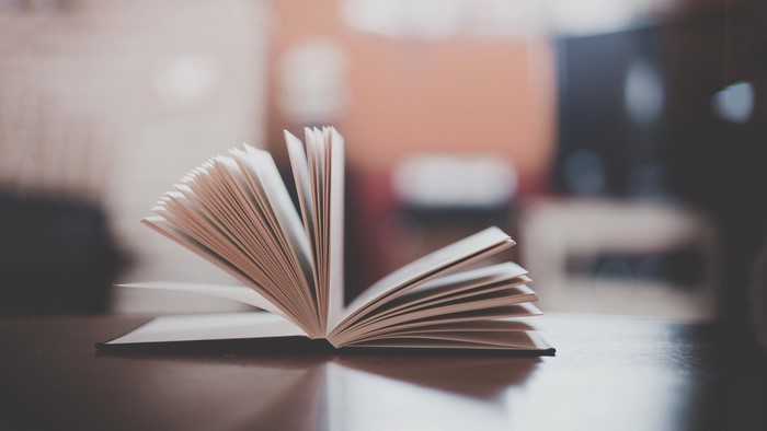 Open book on a wooden table
