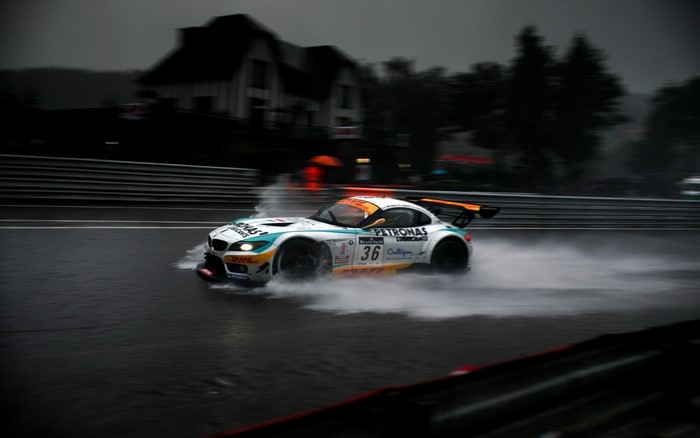 BMW Z4 GT3 racing car on a wet track