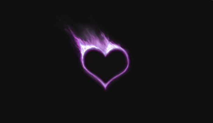 Purple Flaming Heart on Black Background