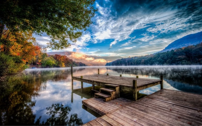 Peaceful Lake Pier at Misty Autumn Sunset