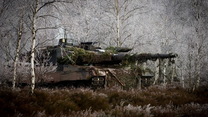 Leopard 2 Tank Camouflaged in Winter Forest