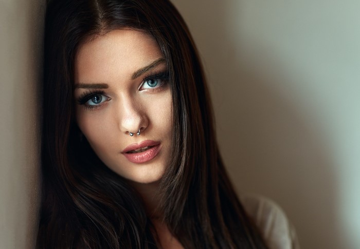 Closeup Portrait of a Brunette Woman with Nose Ring