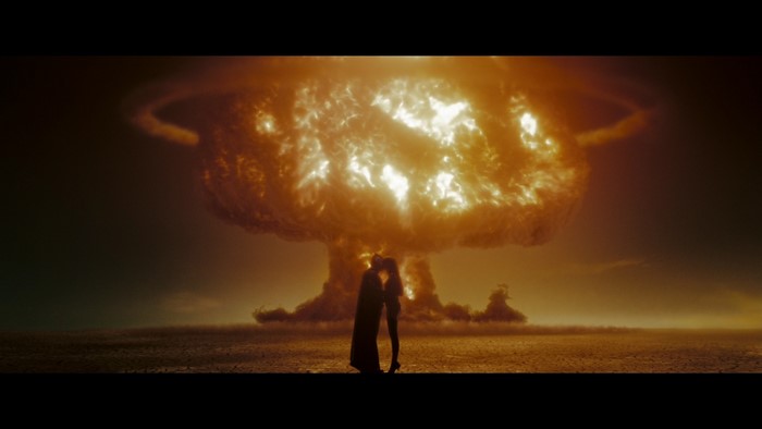 Silk Spectre from Watchmen in front of nuclear explosion