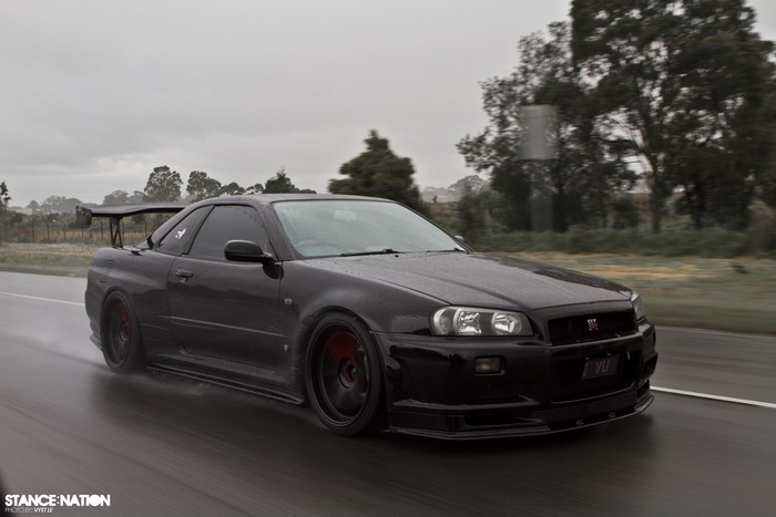 Black Nissan Skyline GT-R R34 in Rain