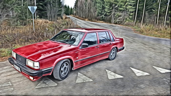 Red Volvo 740 16V at a Forest Intersection