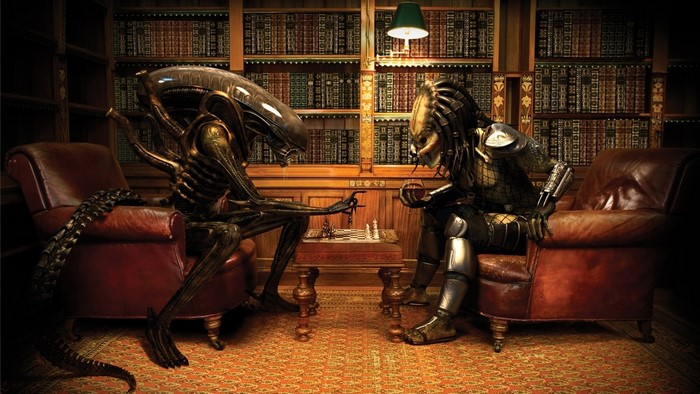 Alien and Predator playing chess in a library