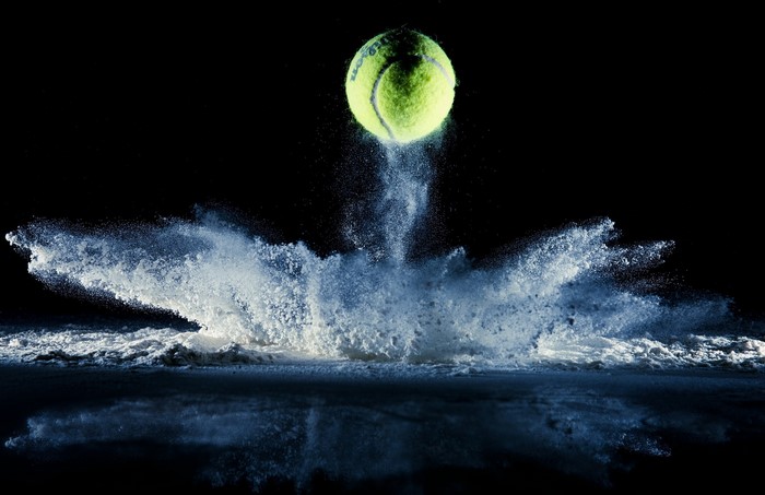 Tennis ball exploding in powder and water