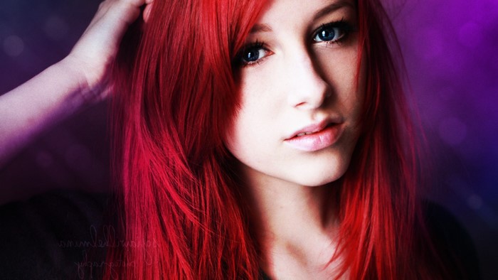 Redhead woman with blue eyes