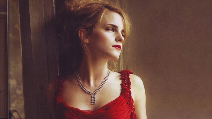 Emma Watson in a red dress wearing a necklace