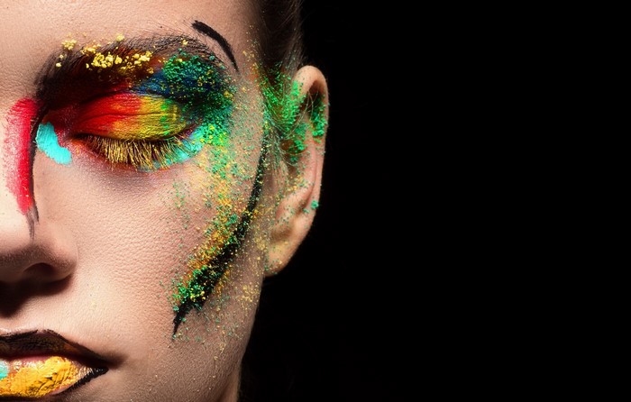 Vibrant Colorful Makeup Art on Woman's Face