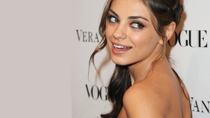 Mila Kunis at Vogue event