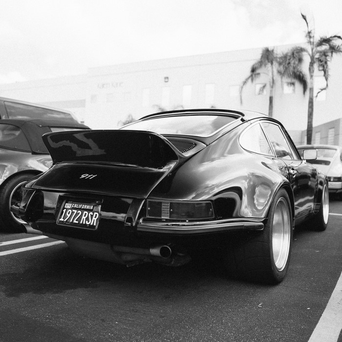 Black 1972 Porsche 911 RSR with California license plate