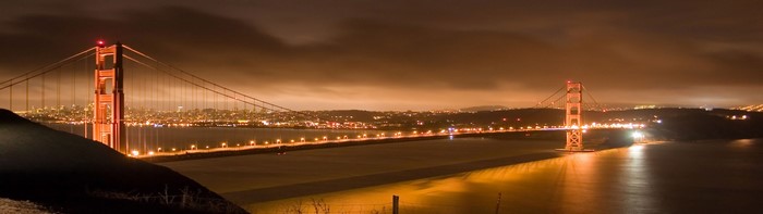 Golden Gate Bridge at night with San Francisco cityscape
